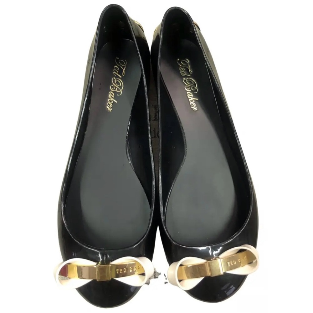 Ted Baker London Black and Gold Flats with Elegant Bow